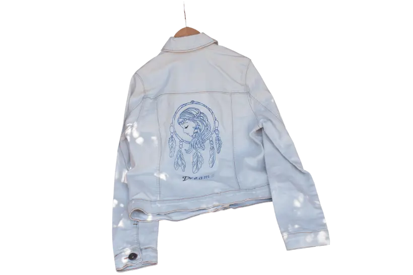 White child's denim jacket with a dreamcatcher embroidery